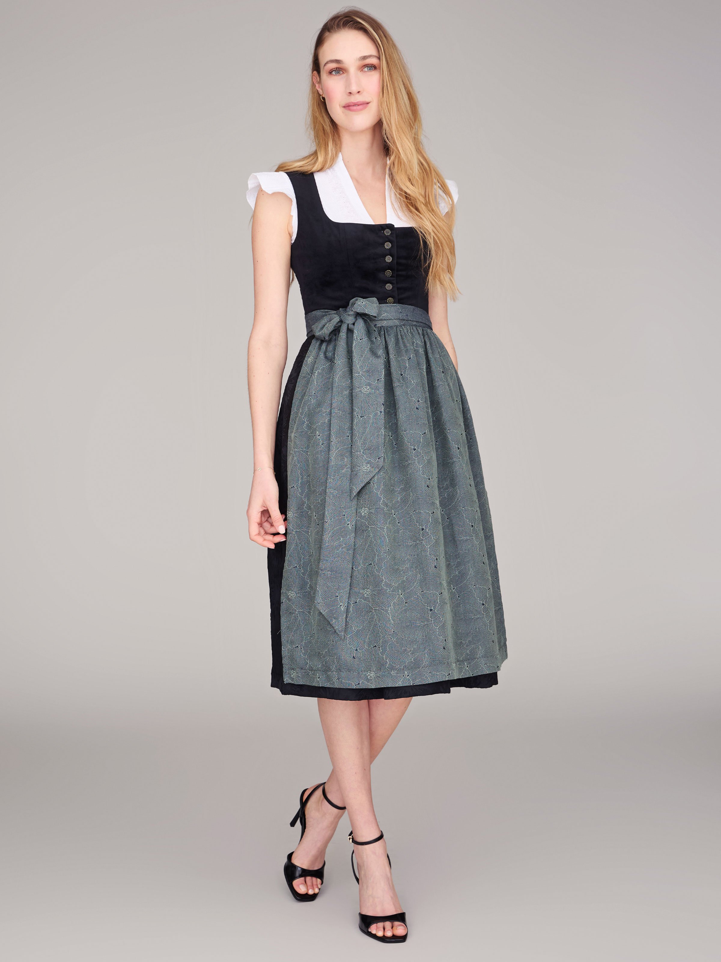 Schwarzes Dirndl mit Knöpfen