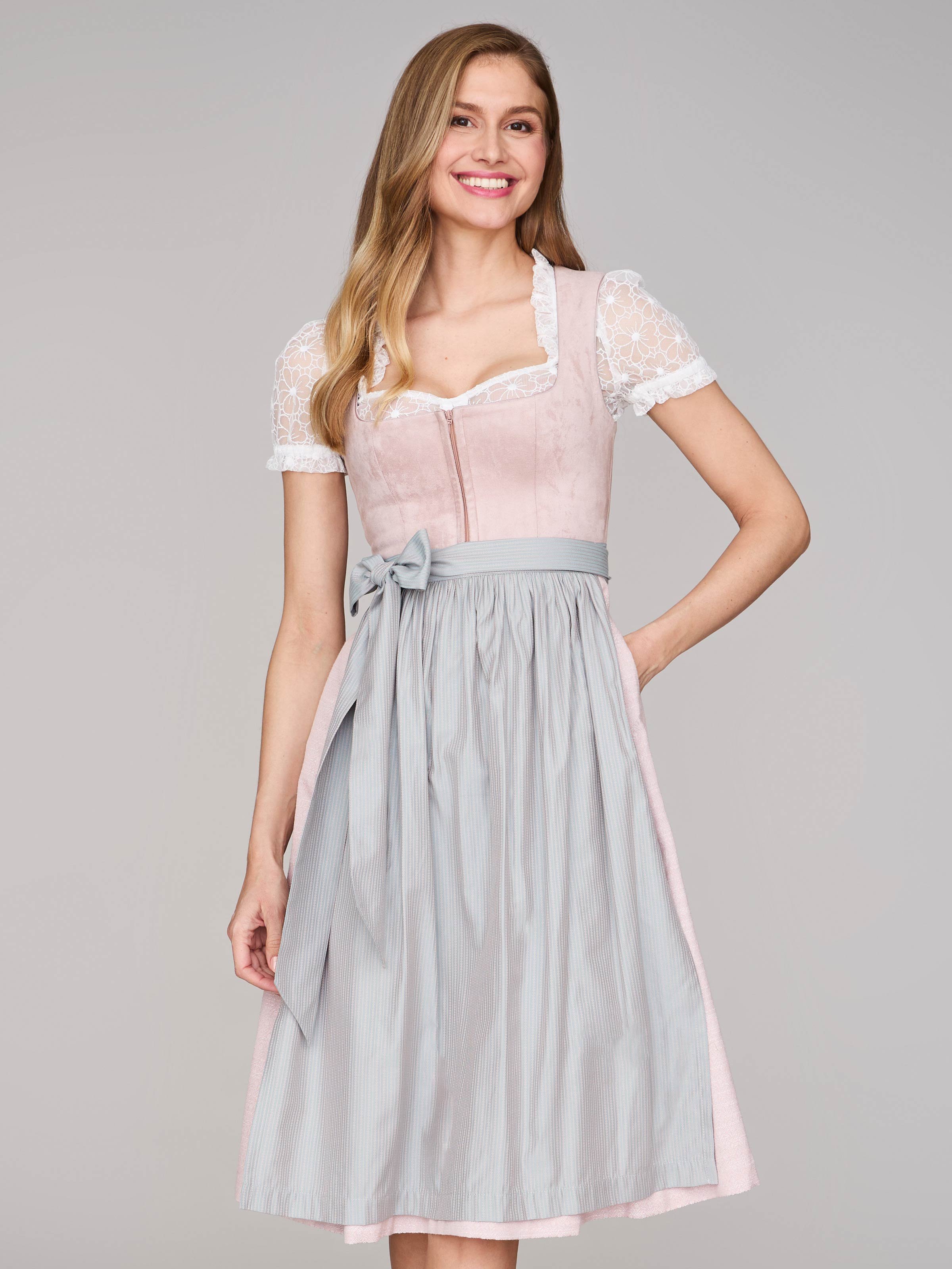 Rosé-farbenes Dirndl mit Velours-Mieder