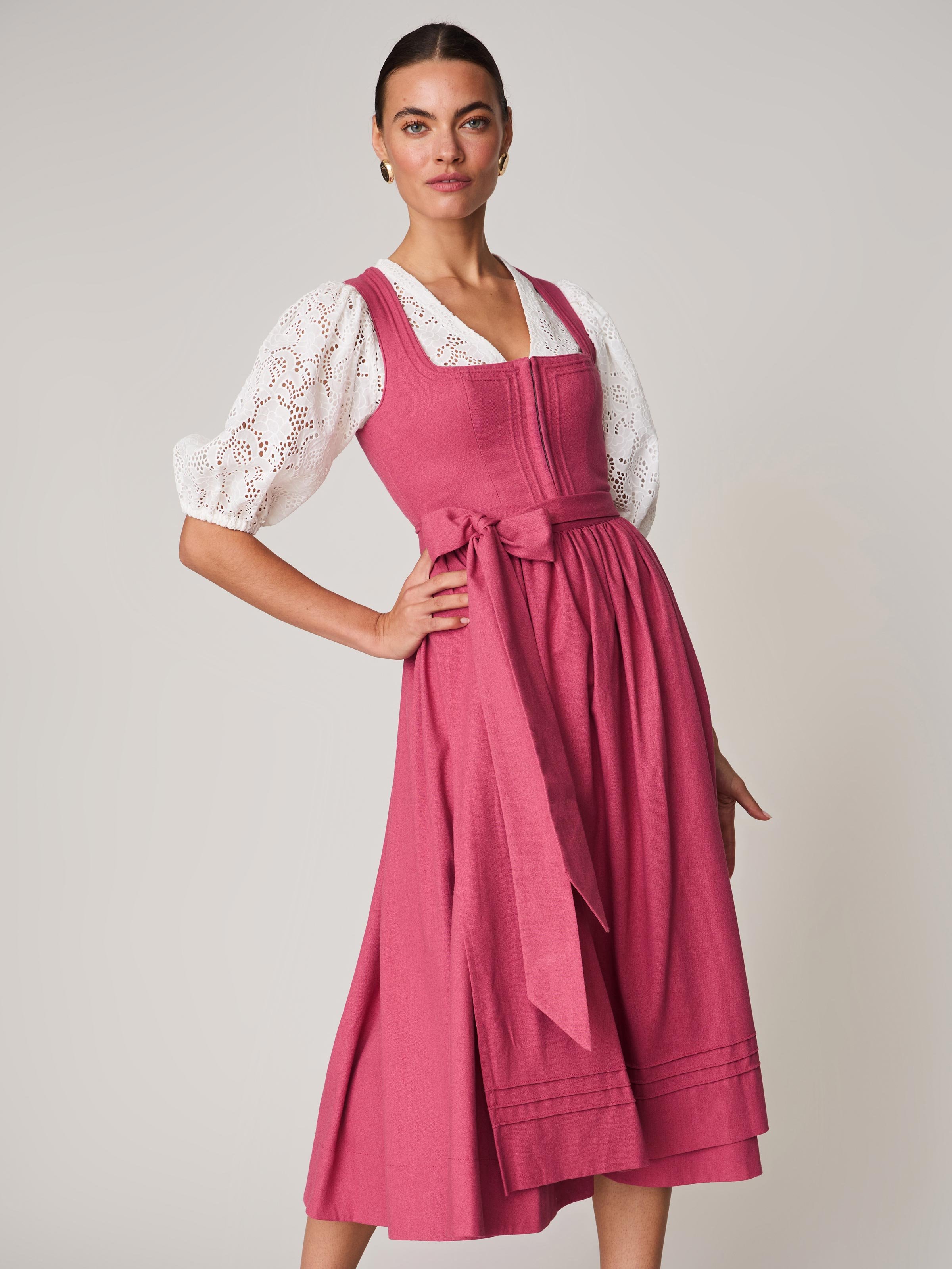 Himbeerrotes Leinen-Dirndl mit Schnursteppung 