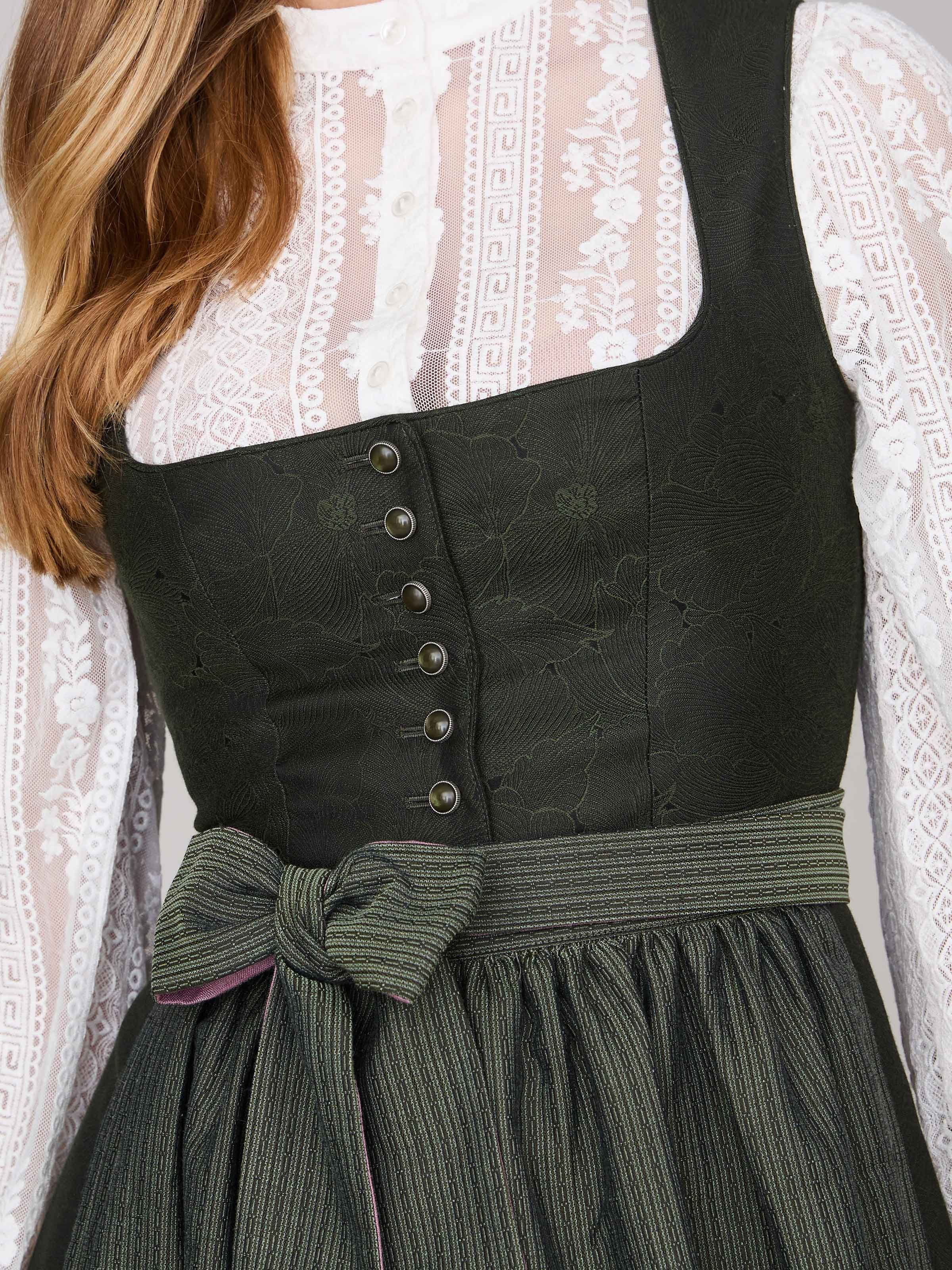 Grünes Dirndl mit Knöpfen 