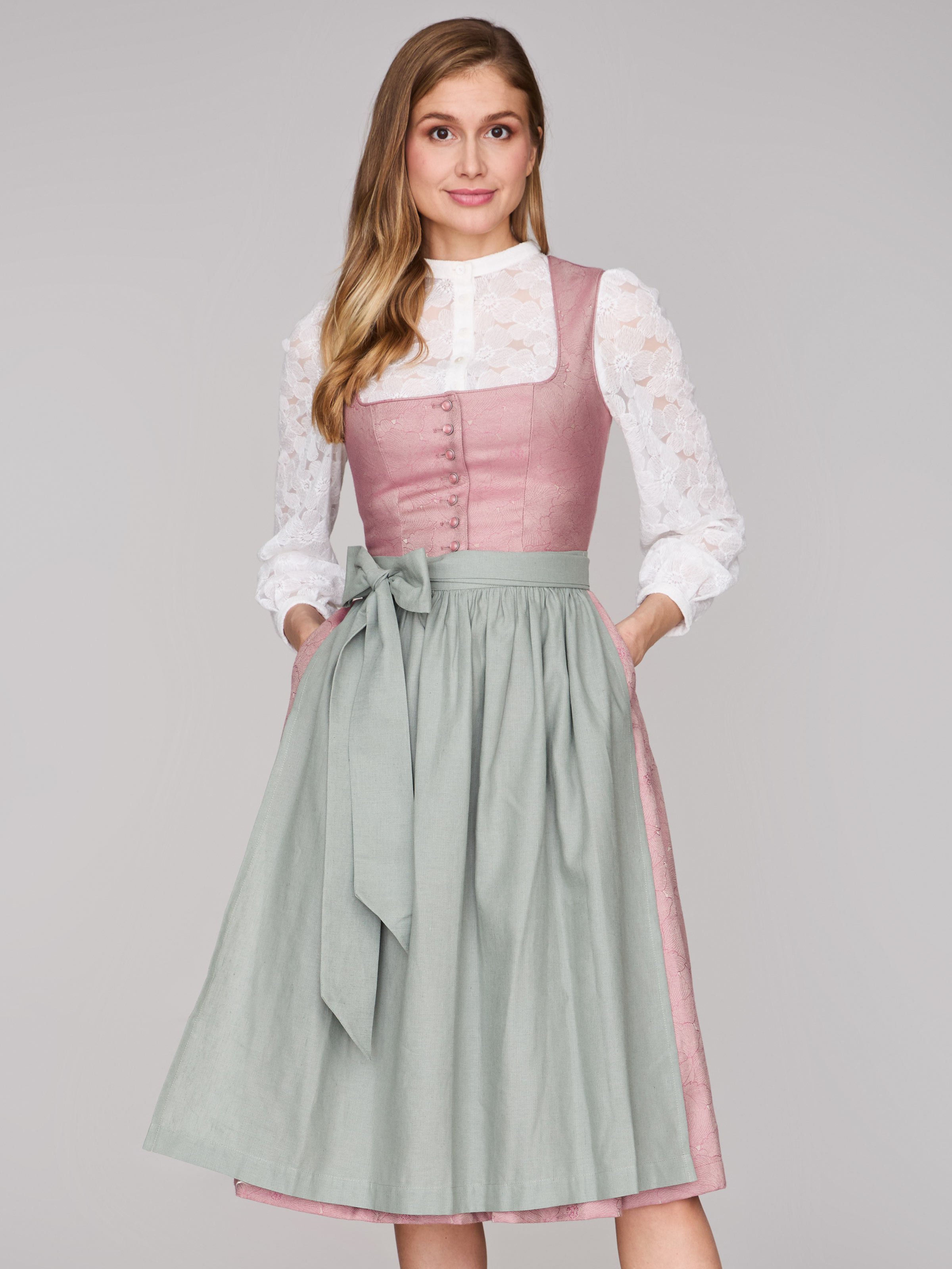 Rosa-farbenes Dirndl mit Knöpfen